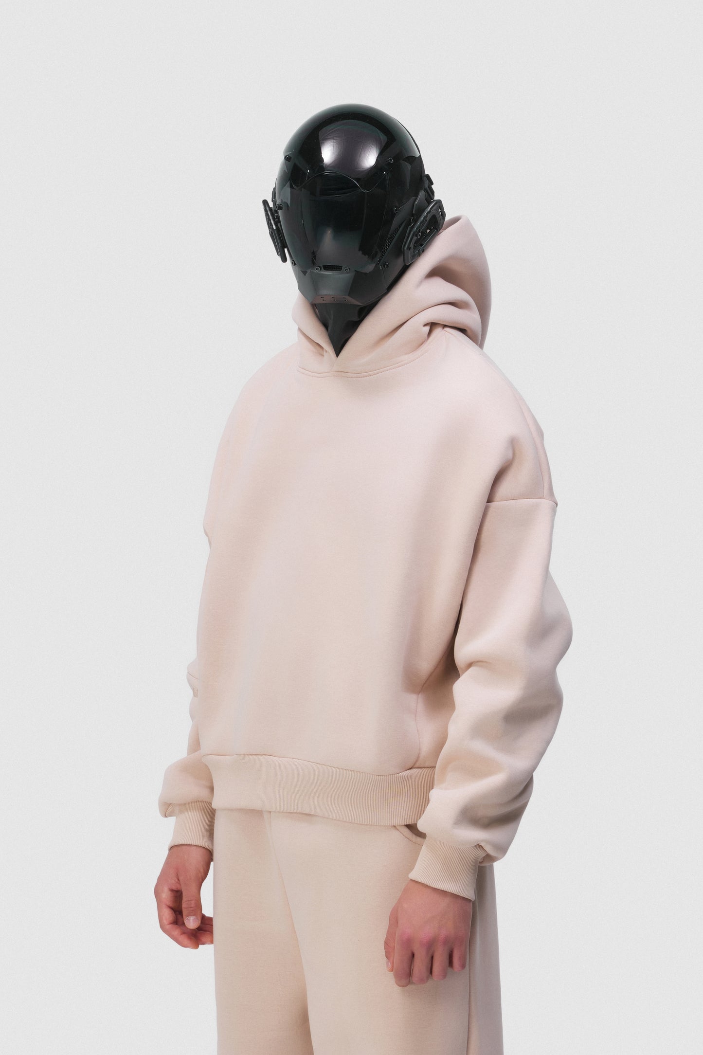 THIS HOODIE DOESN'T SHOUT, IT HAUNTS.