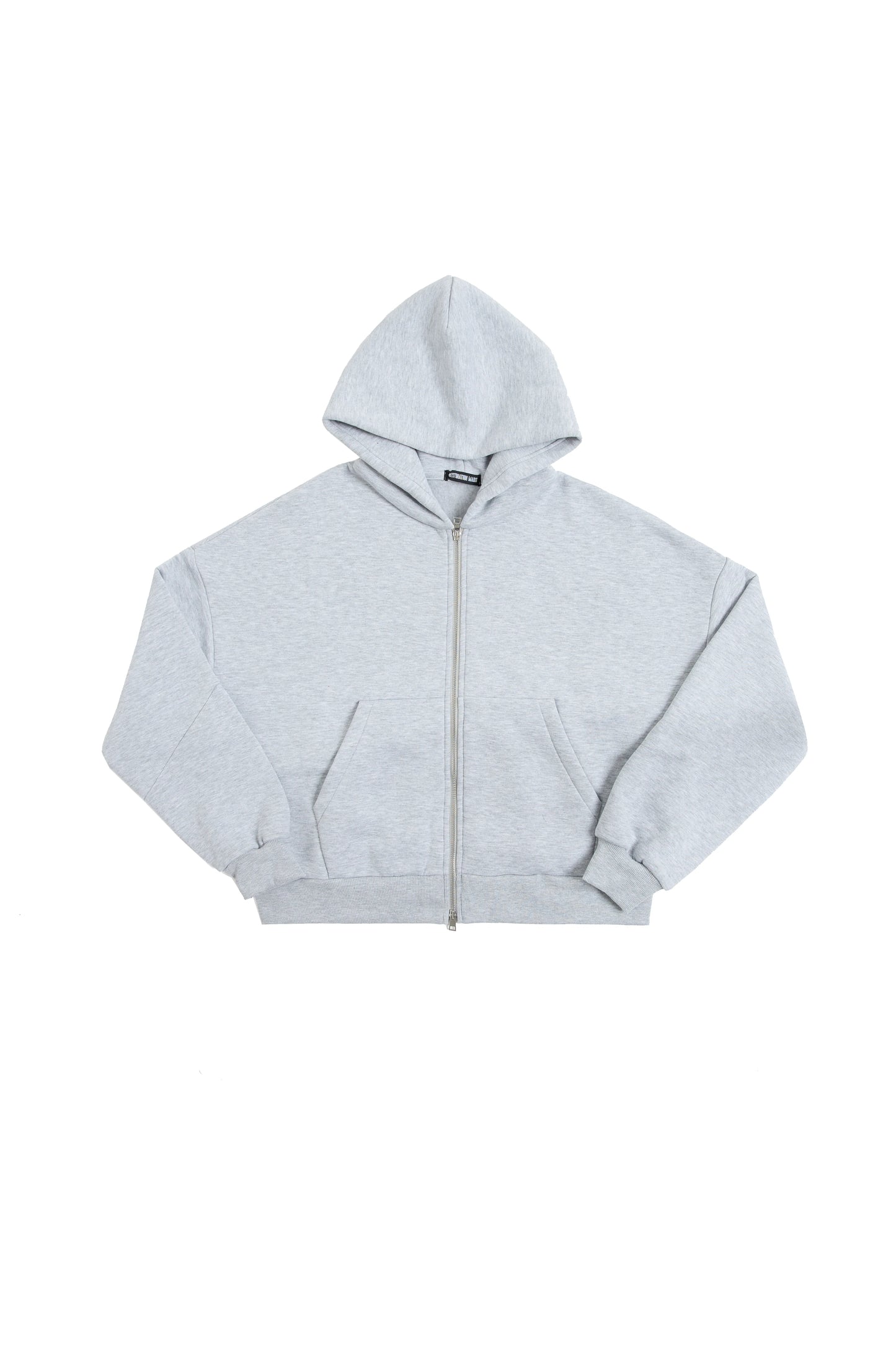 THIS ZIP HOODIE SLIPS ON QUIET AND LEAVES A MARK.