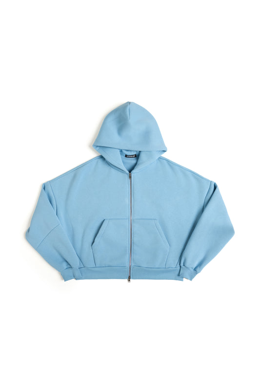 THIS ZIP HOODIE SLIPS ON QUIET AND LEAVES A MARK.