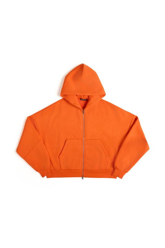 THIS ZIP HOODIE SLIPS ON QUIET AND LEAVES A MARK.