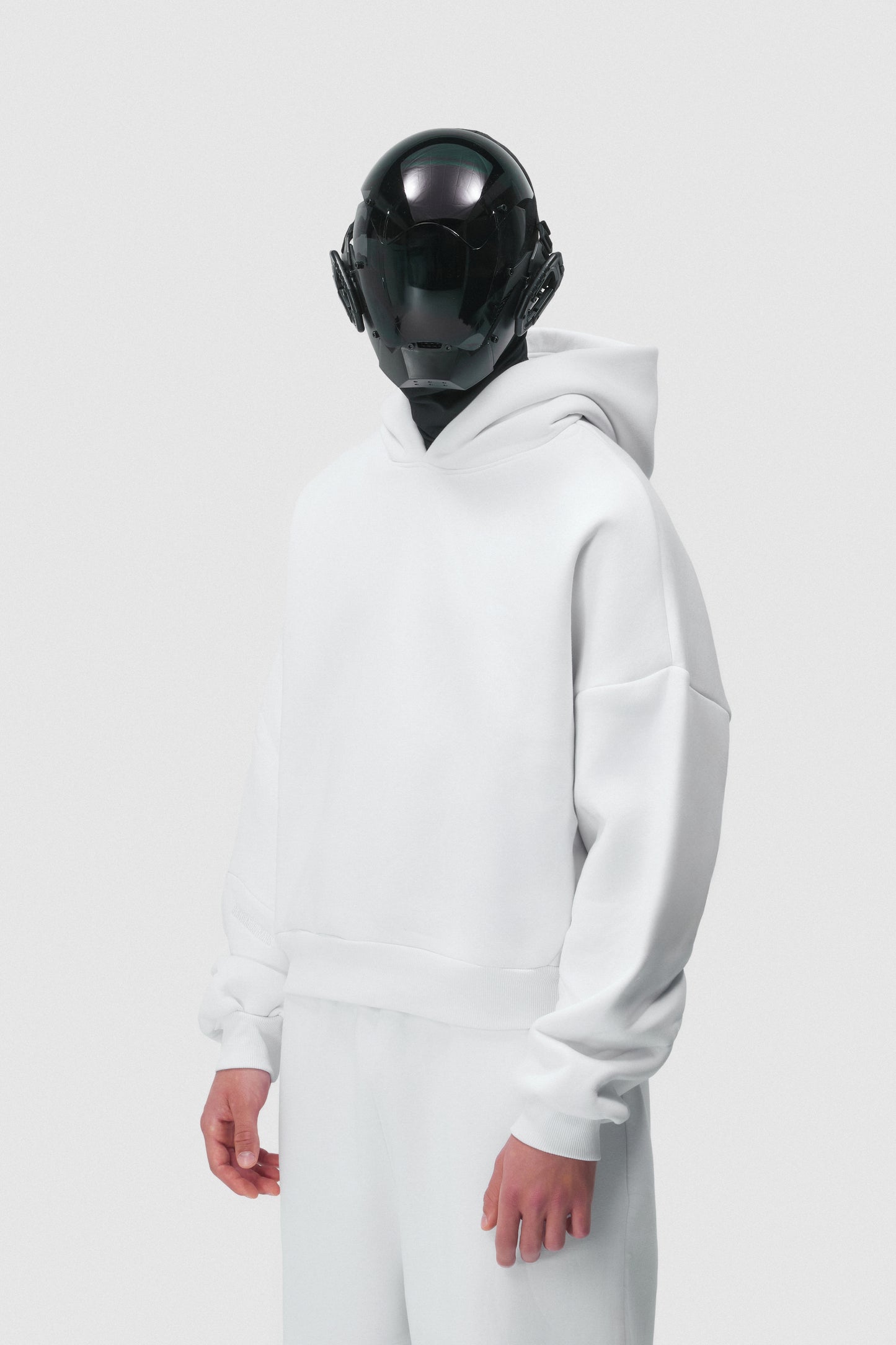 THIS HOODIE DOESN'T SHOUT, IT HAUNTS.