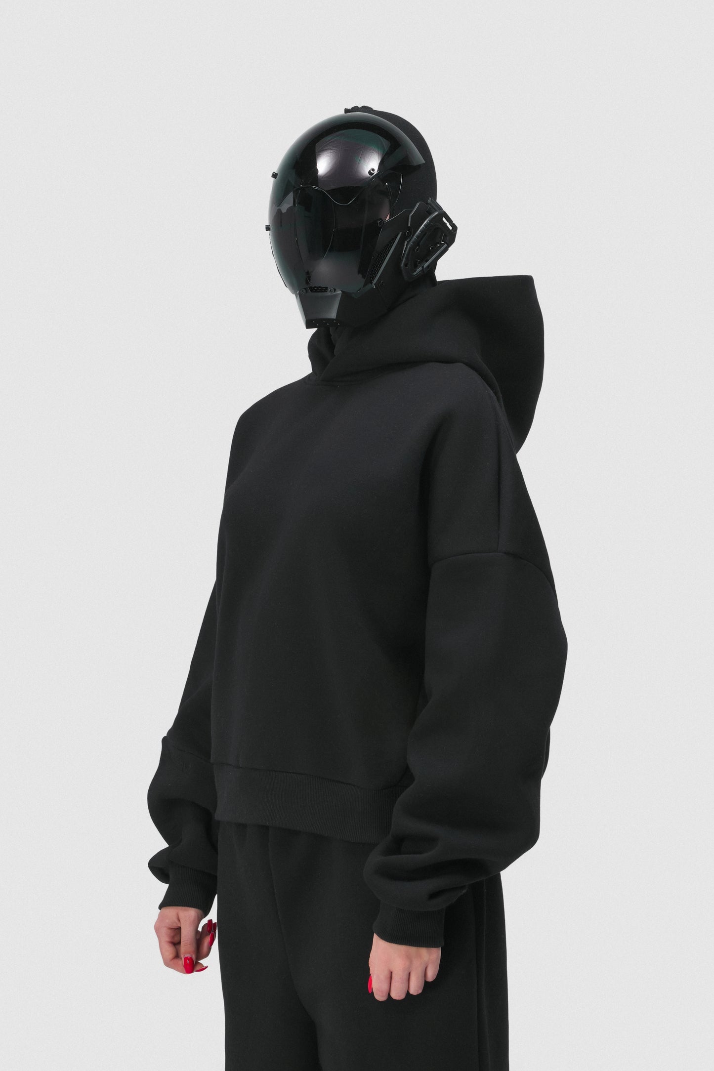 THIS HOODIE DOESN'T SHOUT, IT HAUNTS.