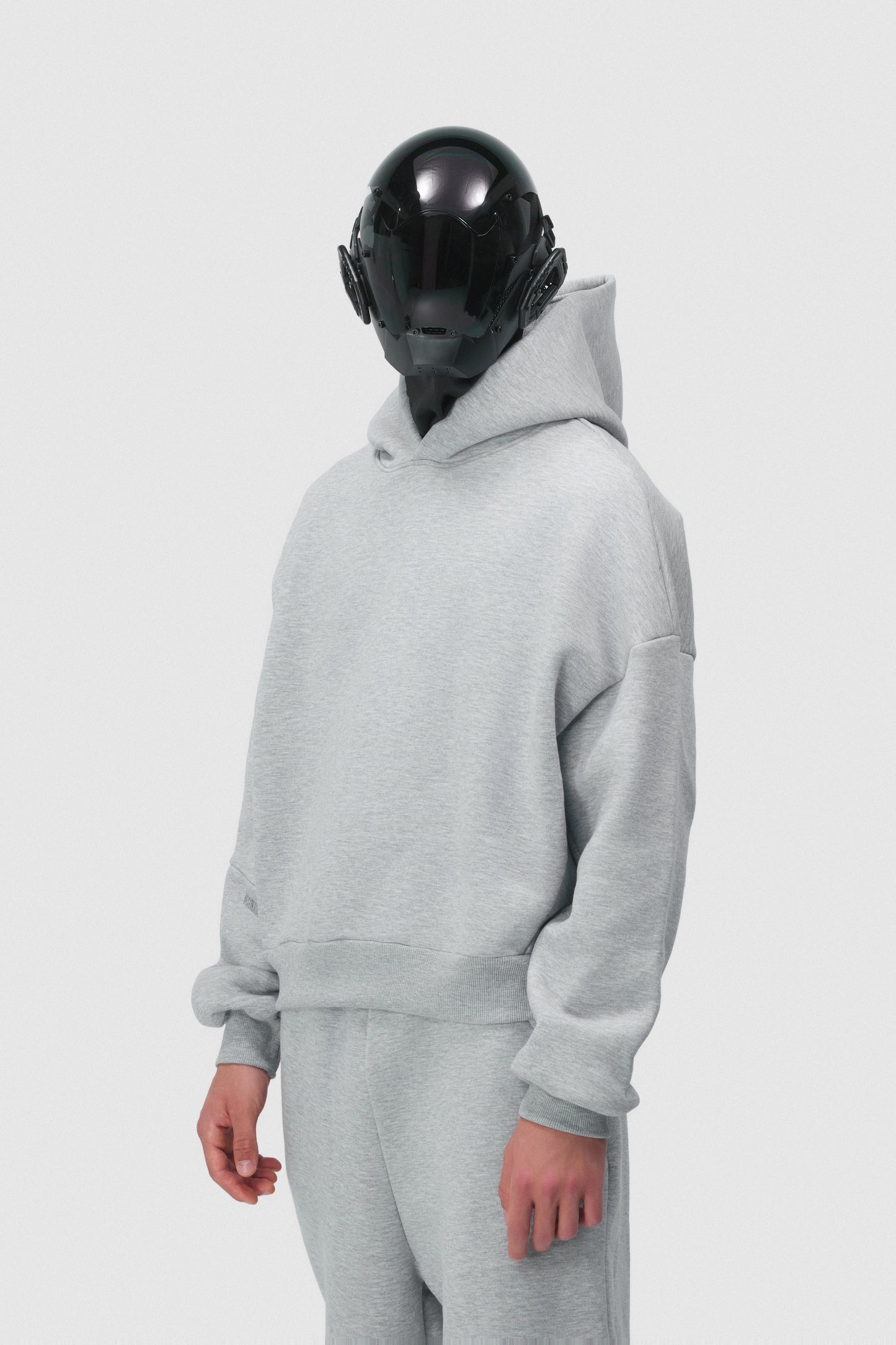 THIS HOODIE DOESN'T SHOUT, IT HAUNTS.