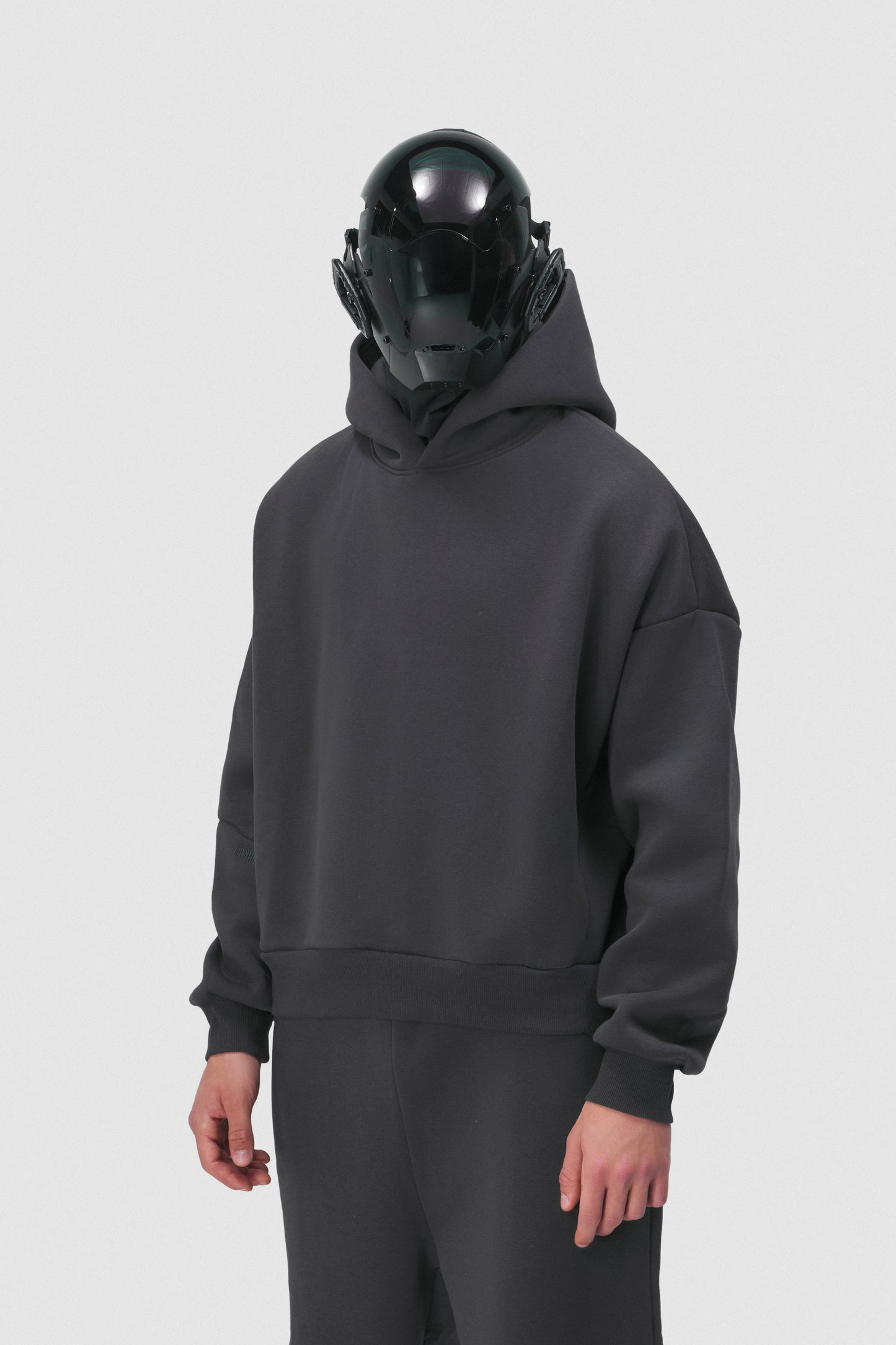 THIS HOODIE DOESN'T SHOUT, IT HAUNTS.