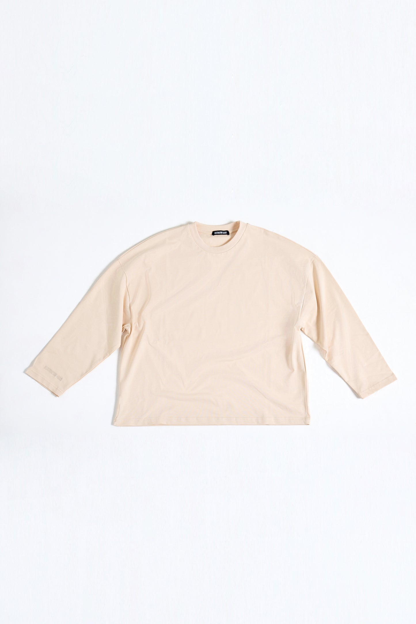 THIS LONG SLEEVE DOESN'T COMPETE, IT DOMINATES.