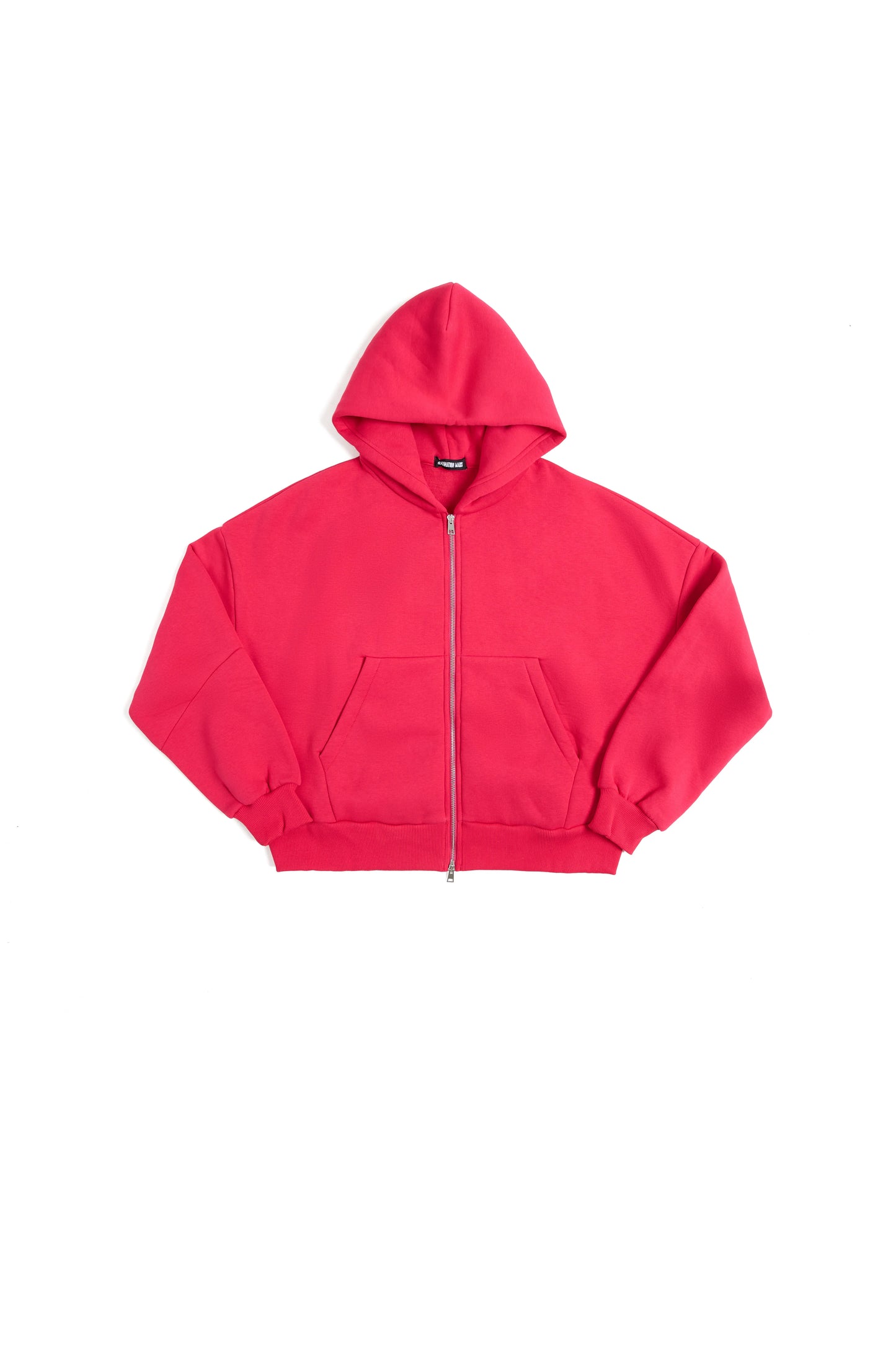THIS ZIP HOODIE SLIPS ON QUIET AND LEAVES A MARK.